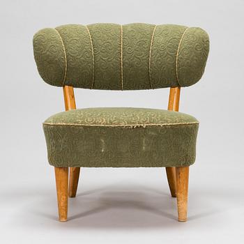 Lisa Johansson-Pape, a 1940's armchair for  Keravan Puusepäntehdas, Stockmann.