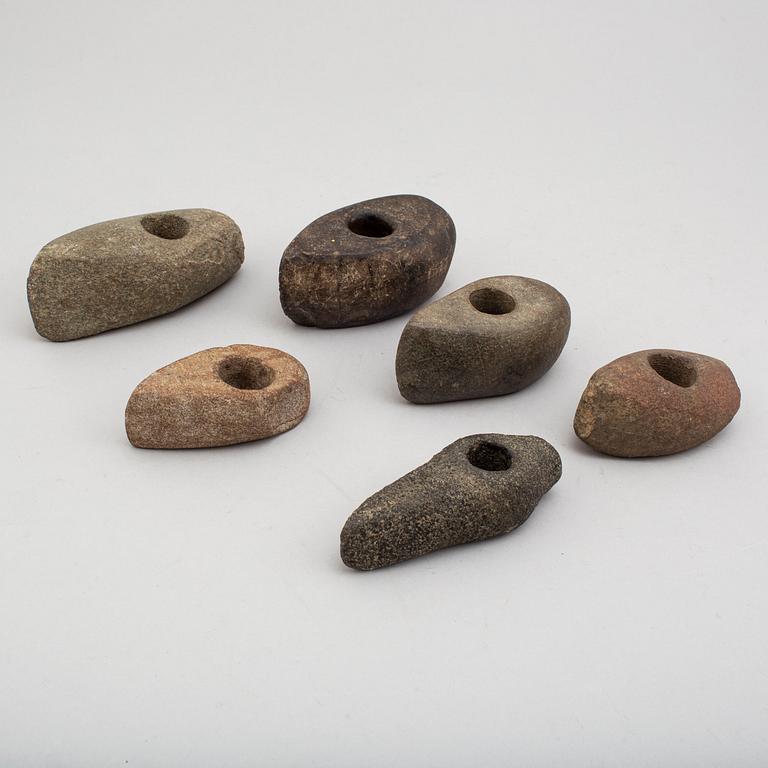 Six neolithic stone axes.