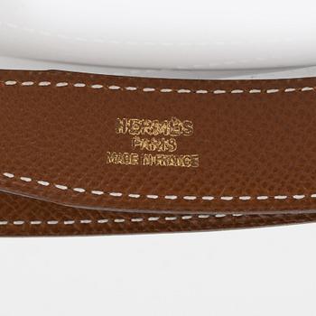 Hermès, A reversible leather and gold hardware 'Constance' belt from 1997.