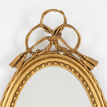 A gilded mirror, early 20th century.