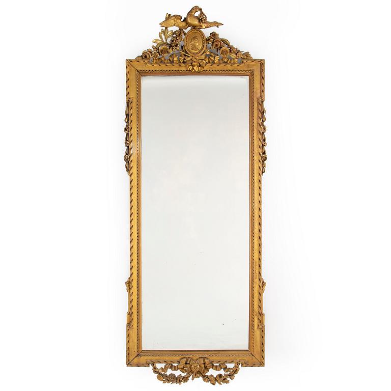 An end of the 19th Century Louis Xvi-style mirror.