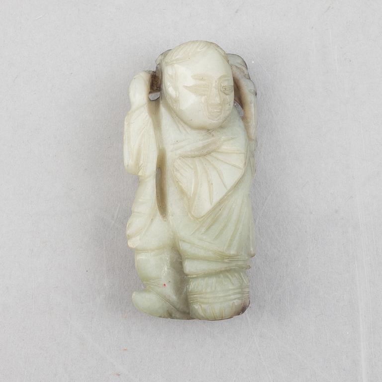 A group of four Chinese stone charms, 20th century.