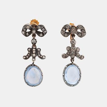 373. A pair of gold and silver earrings set with cabochon-cut sapphires and rose-cut diamonds.