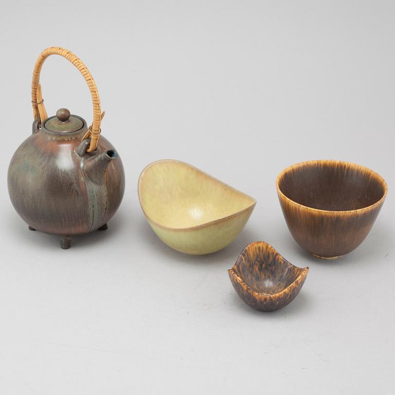 a stoneware teapot and three bowls for Rörstrand.