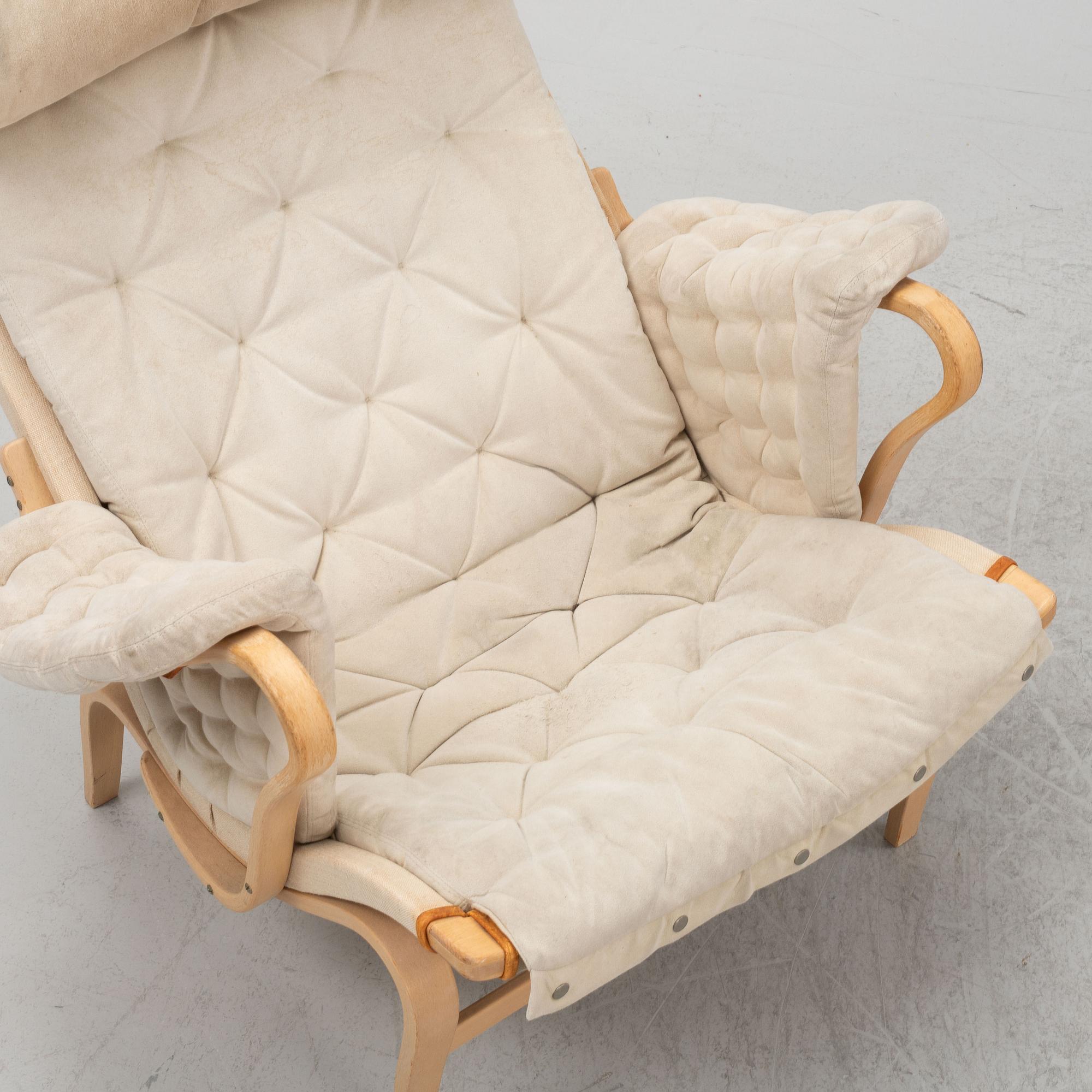 Bruno Mathsson, fåtölj med fotpall, "Pernilla", Dux.