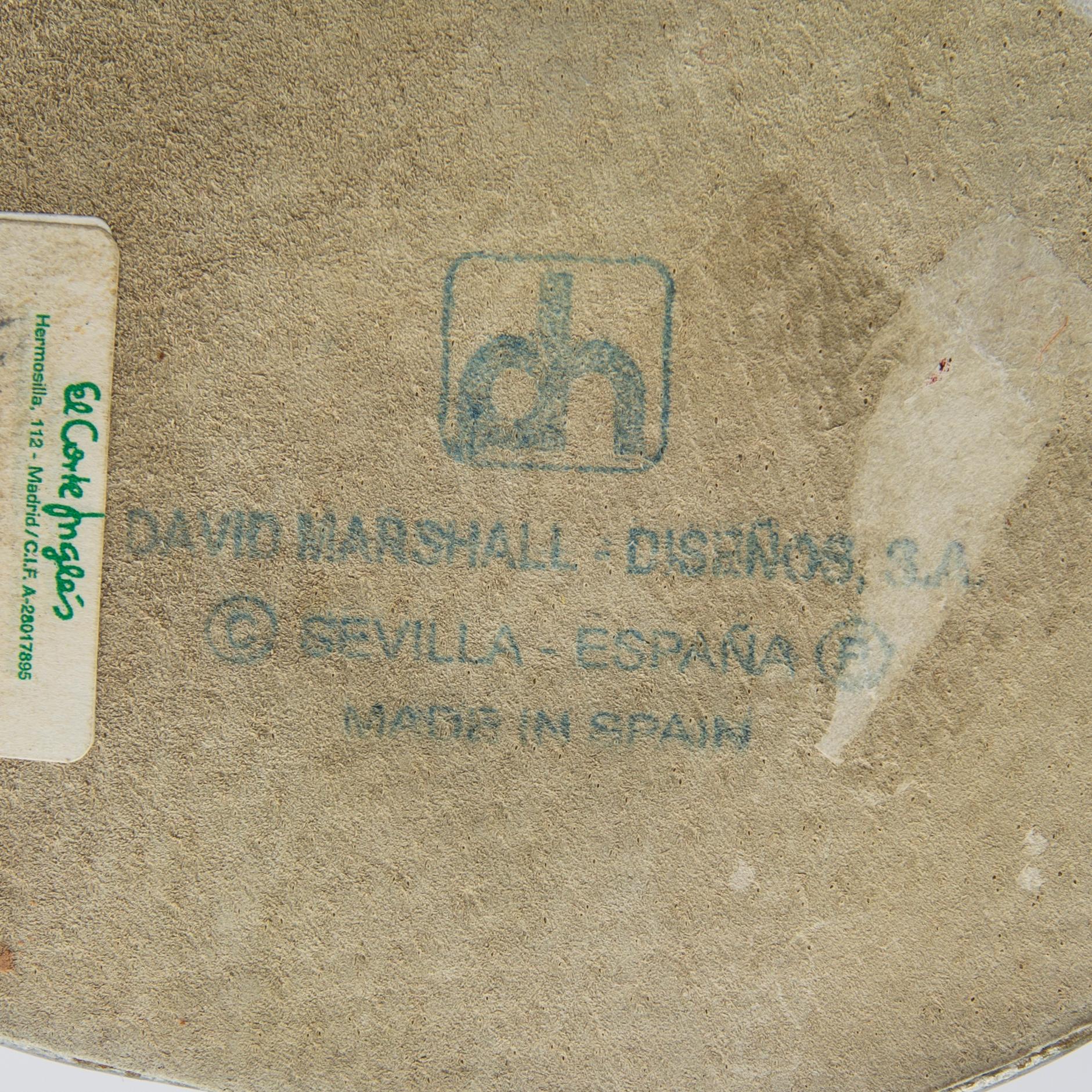 David Marshall, a bowl and two candle sticks.