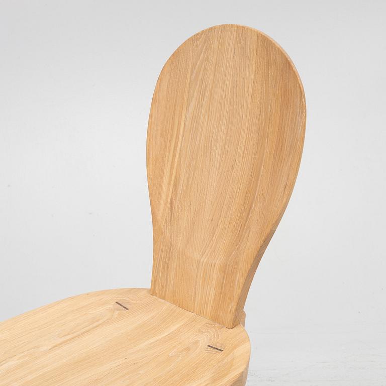 Carl Malmsten, a "skedblad" chair, Tre Sekel, Sweden, 21st century.