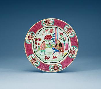 1621. A famille rose 'European Subject' dinner plate, Qing dynasty, Yongzheng (1723-35).