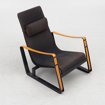 Jean Prouvé, a 'Cité' easy chair, Vitra, 2012.