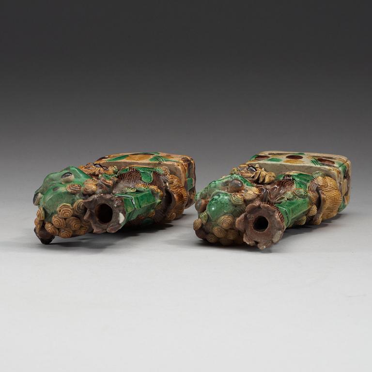 Two green, aubergine and yellow glazed bisquit joss stick holders, Qing dynasty, Kangxi (1662-1722).