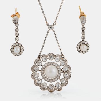 1129. A necklace/brooch and a pair of earrings in platinum and gold set with pearls and old- and rose-cut diamonds.