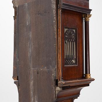 A mahogany veneered longcase clock, marked Peter Pohlmann, London, England, 18th century.