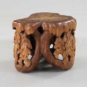 Knut Fjaestad, an Art Nouveau sculptured pine table/stool, Sweden ca 1900.