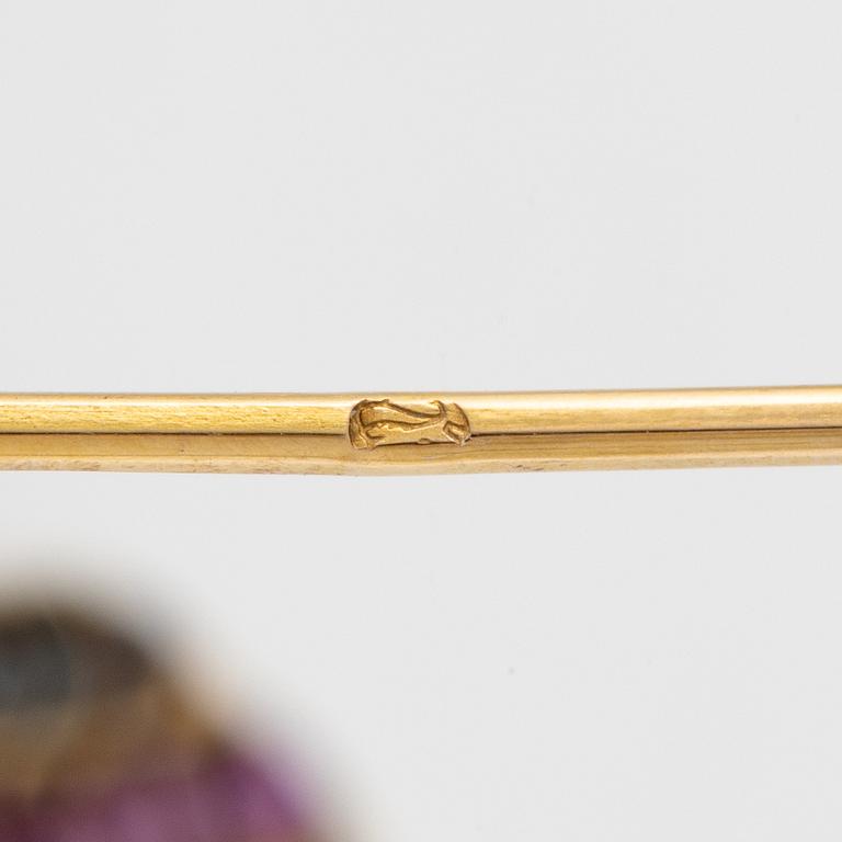 A brooch/pendant  in the form of a dragonfly with emeralds, rubies, sapphires and diamonds, Russia 1899-1908.