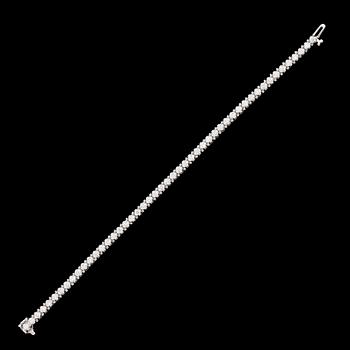 ARMBAND, 14 k vitguld, Rivière, 49 briljantslipade diamanter tot ca 2.80 ct.