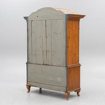 An 18th two-part pine century cabinet.