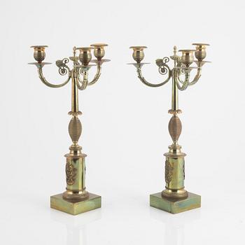 A pair of Empire style candelabra, circa 1900.