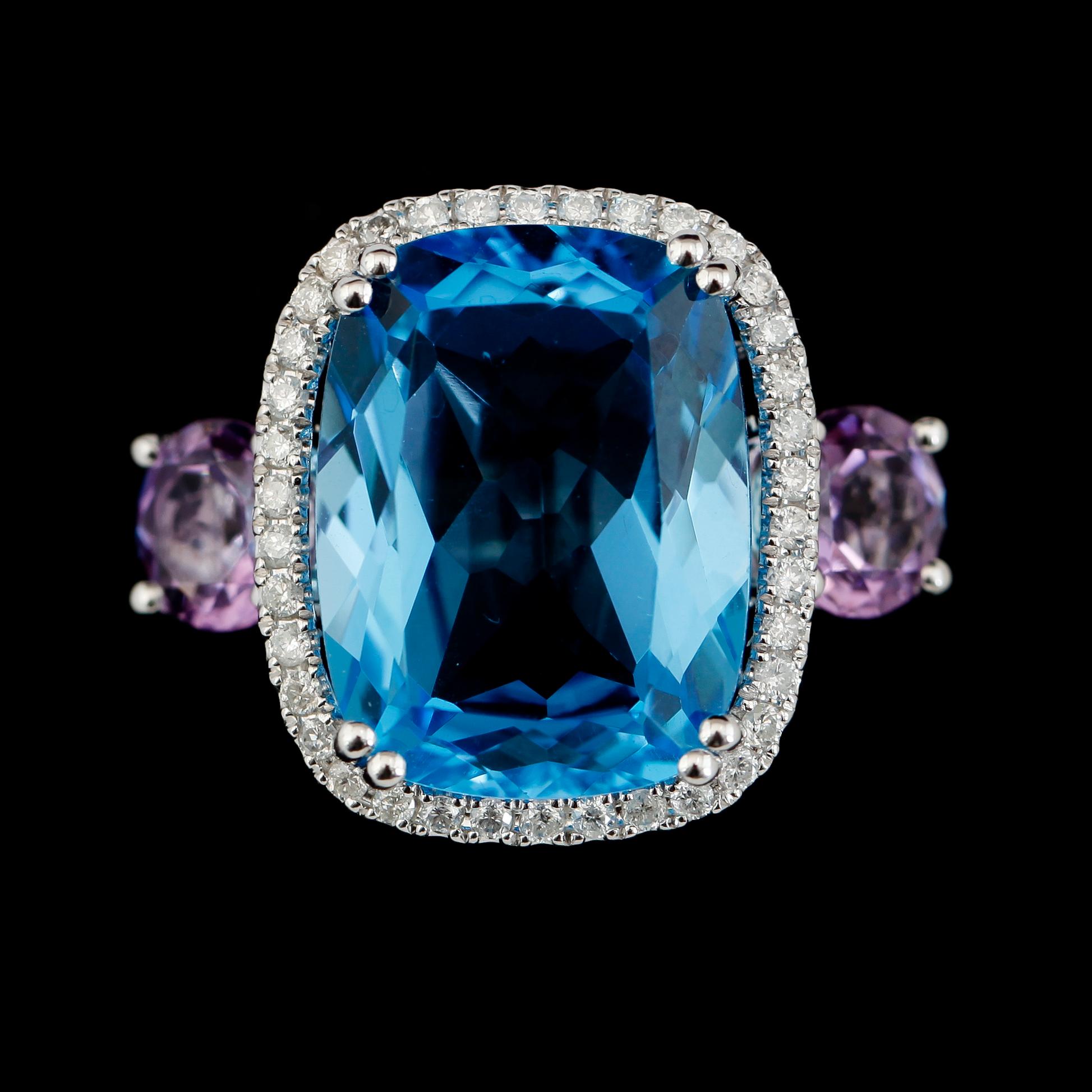 RING, 14K vitguld, blå topas, ametister och diamanter.
