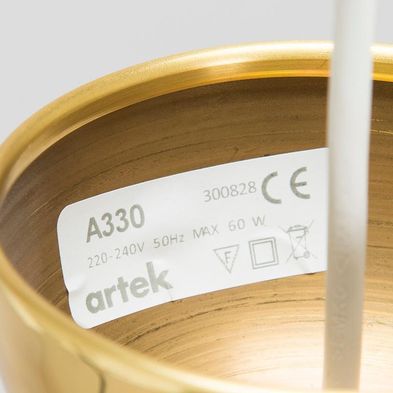 Alvar Aalto, A pair of  A 330, 'Golden Bell' pendant lights A330 for Artek, 2000s.