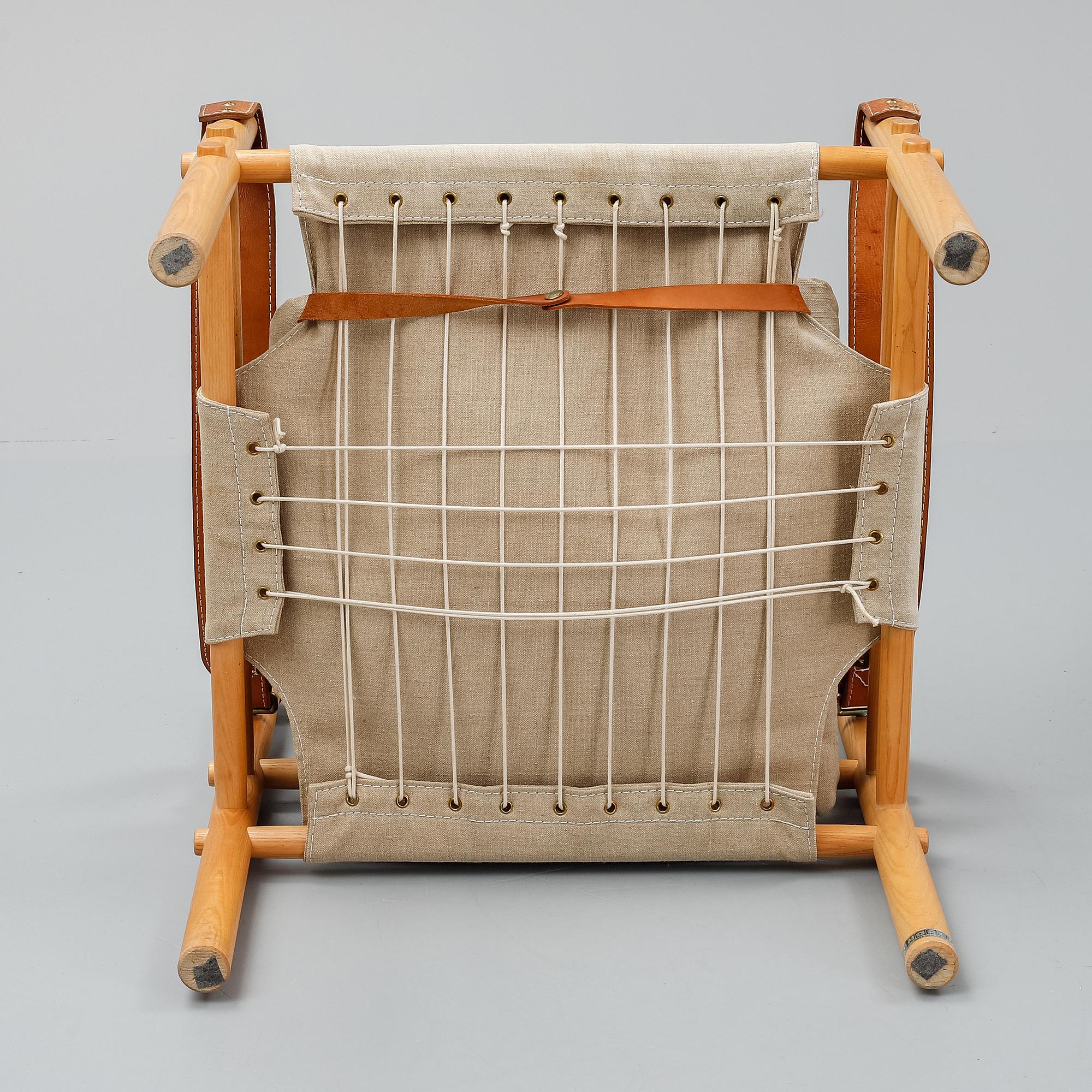 Arne Norell, a set of three "Sirocco" armchairs and two tables, Norell.