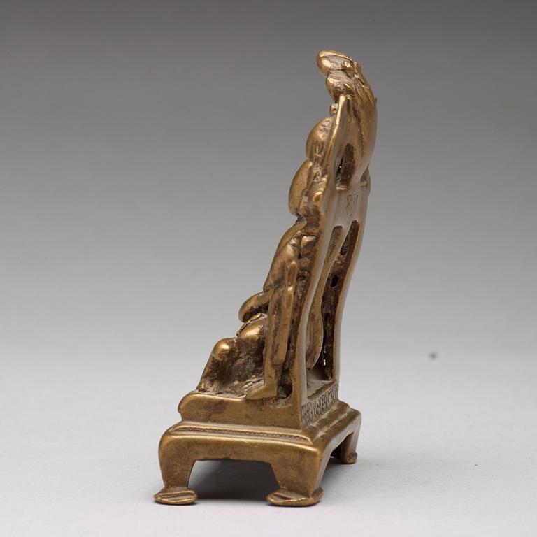 A copper alloy Jain shrine, western India, 19th Century or older. With inscription to the back.