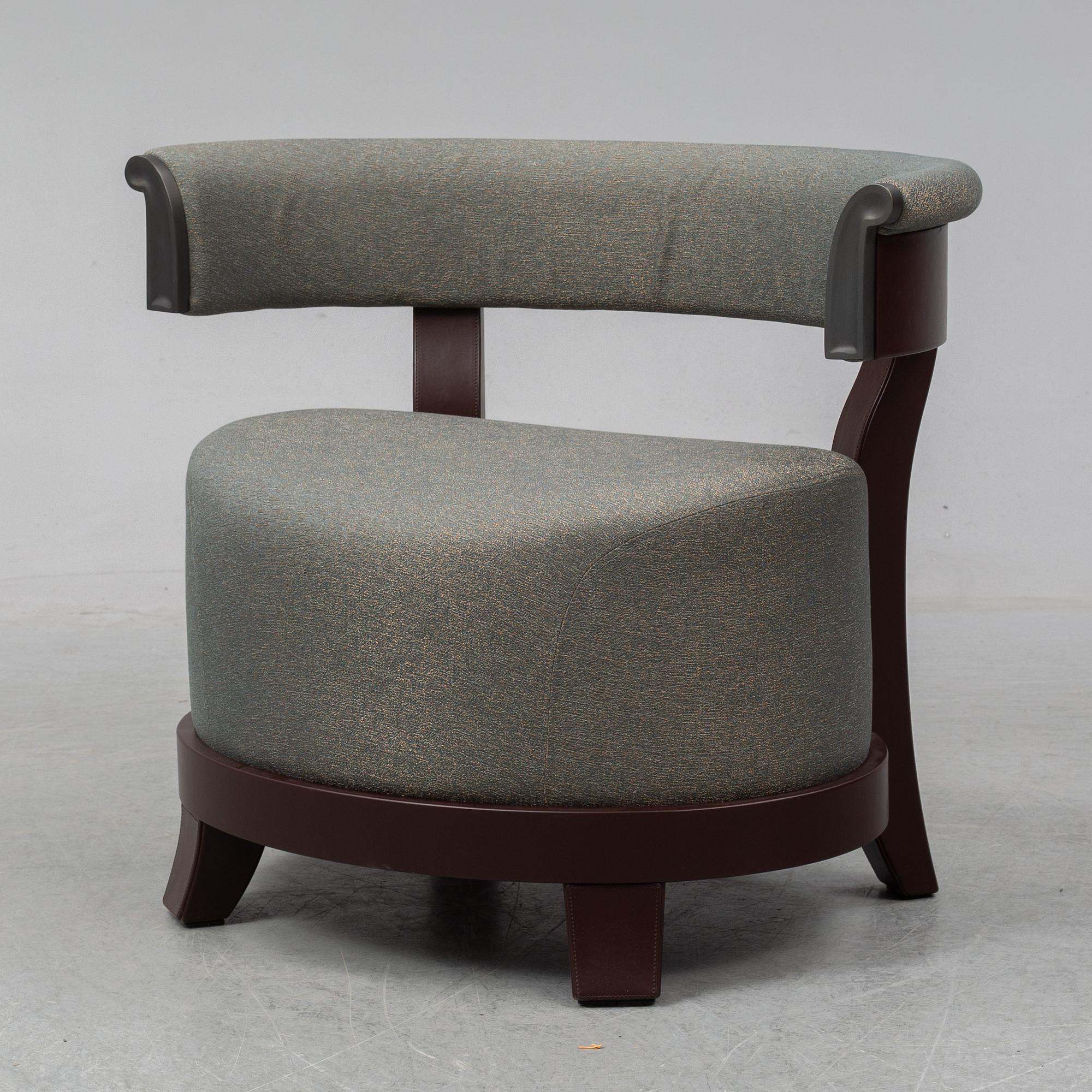 A contemporary 'Chelsea' armchair by Romeo Sozzi for Promemoria Furniture.