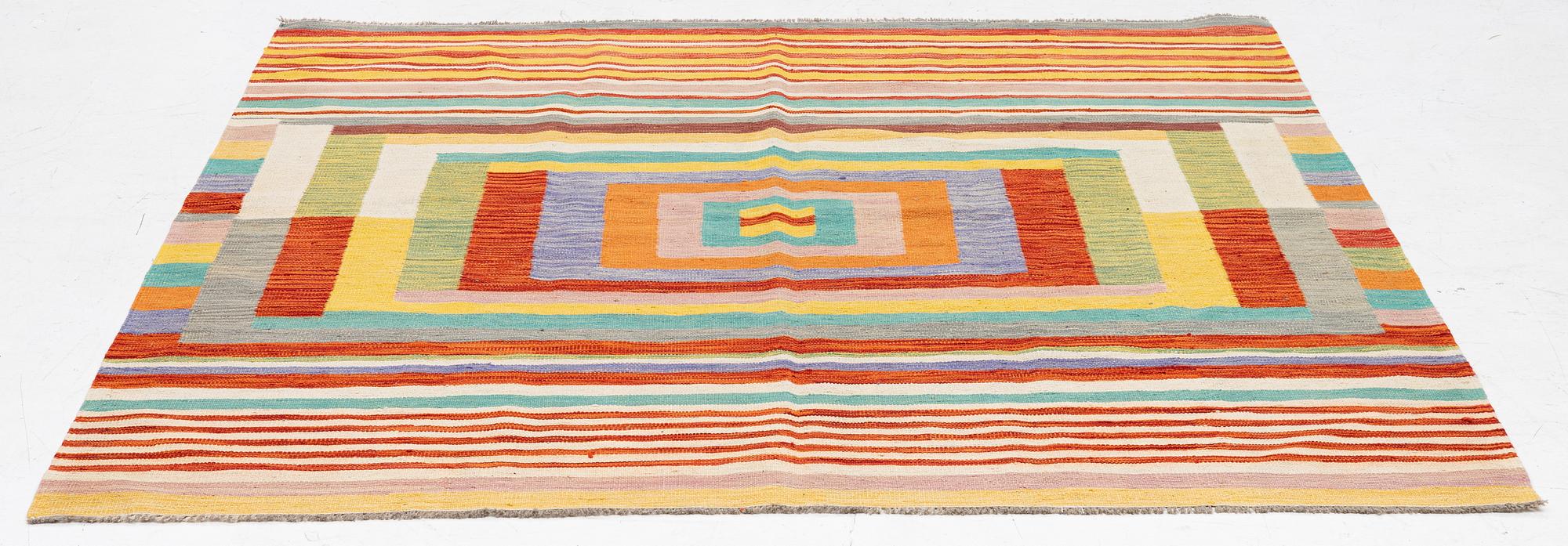 A Kelim rug, c. 200 x 195 cm.