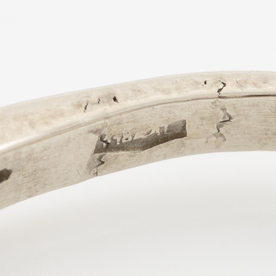 Ring, 18K white gold with brilliant-cut diamond.