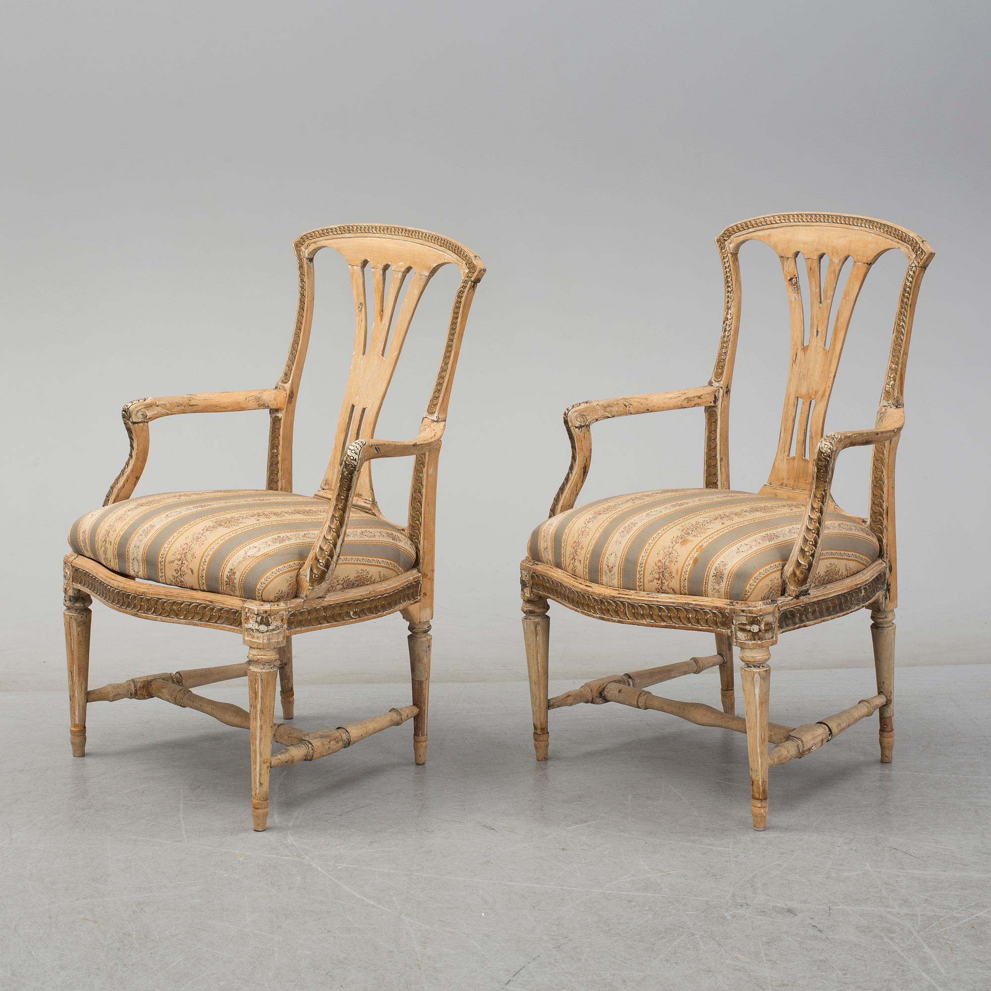 A pair of later part of th 18th century Gustavian arm chairs.