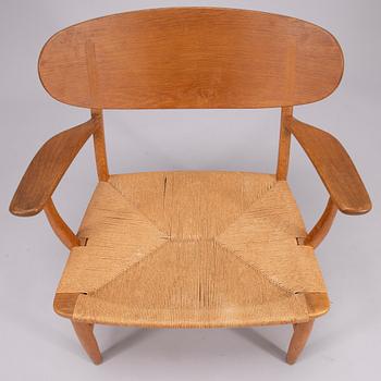 Hans J. Wegner, Fåtölj, modell CH 22, Carl Hansen & Sons, Odense.