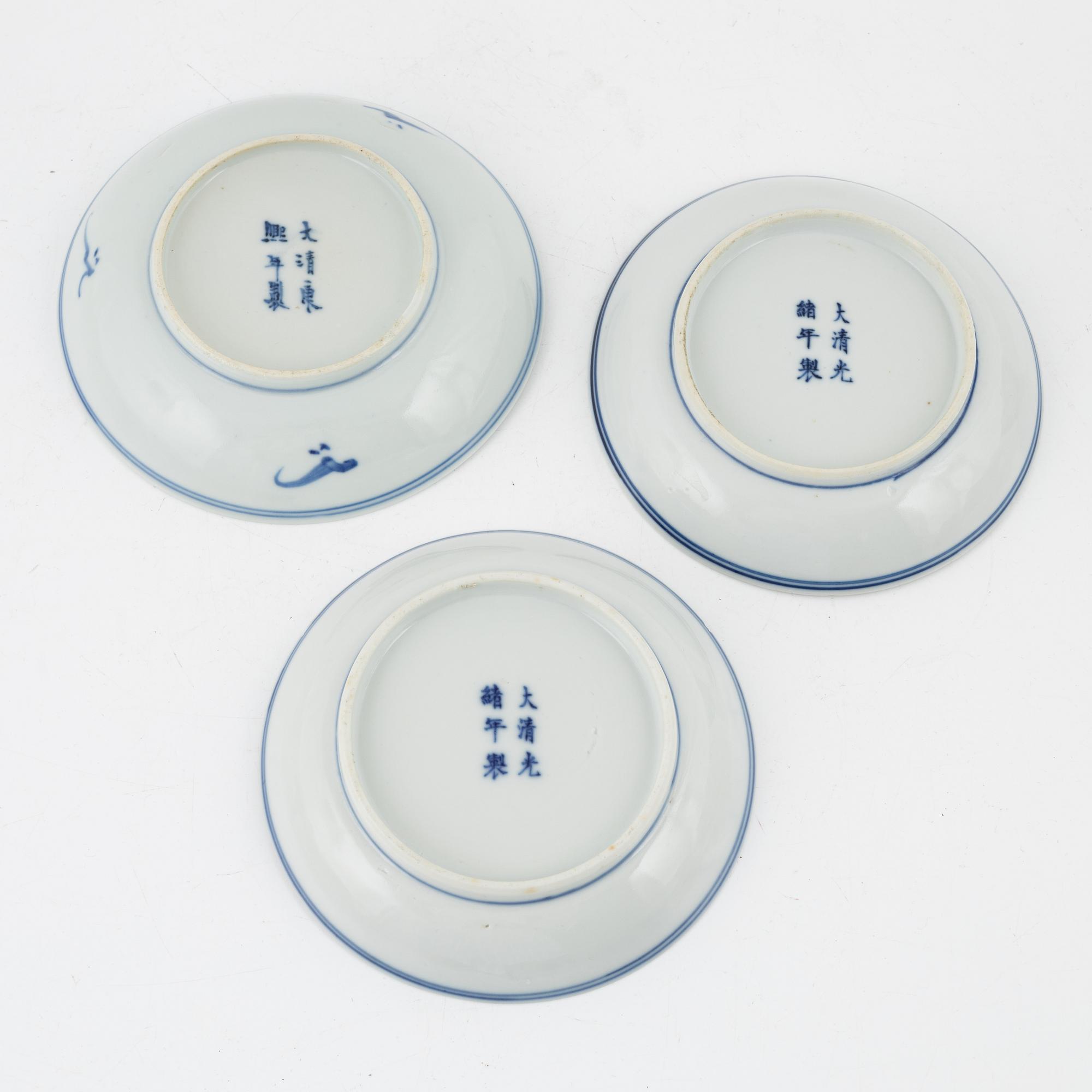 a pair of blue and white cups and three dishes, China, late Qing dynasty.
