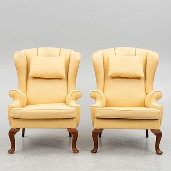 A pair of wingback armchairs, second half of the 20th century.