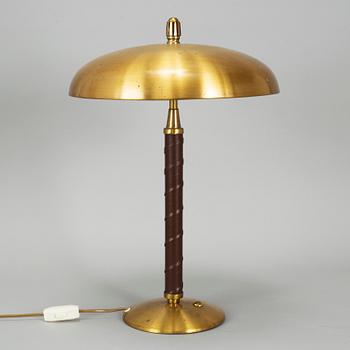 EINAR BÄCKSTRÖM, a model 5013 brass table light, 1940's.