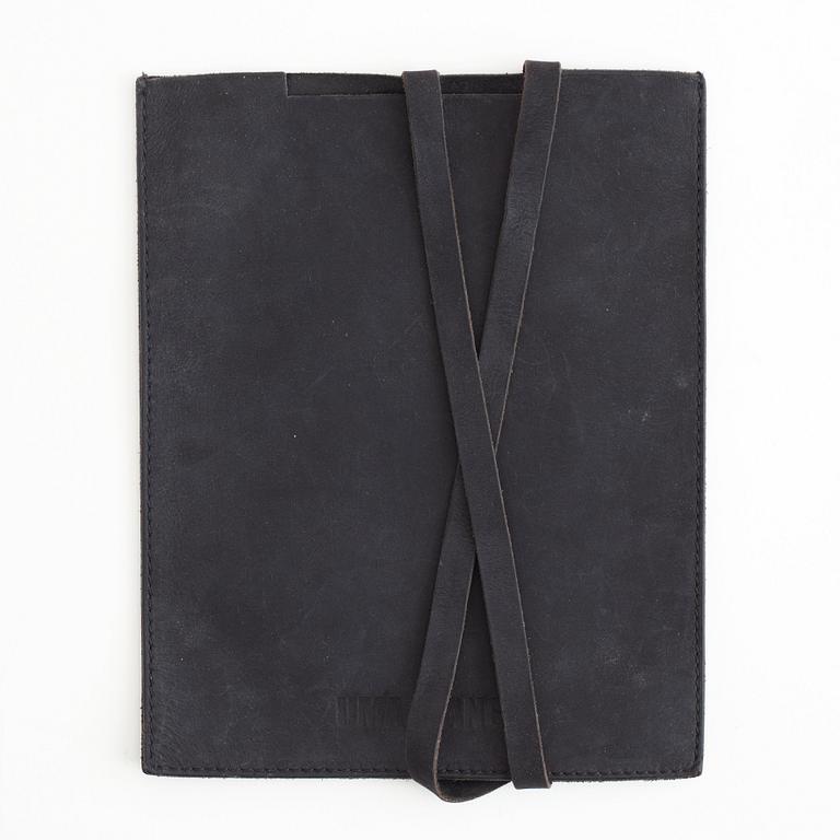 A pair of Uma Wang + Rigards, 'The Victorian', sunglasses and a Uma Wang, ipad case.