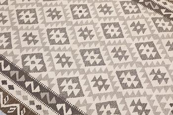 A Kilim rug, approx. 240 x 172 cm.