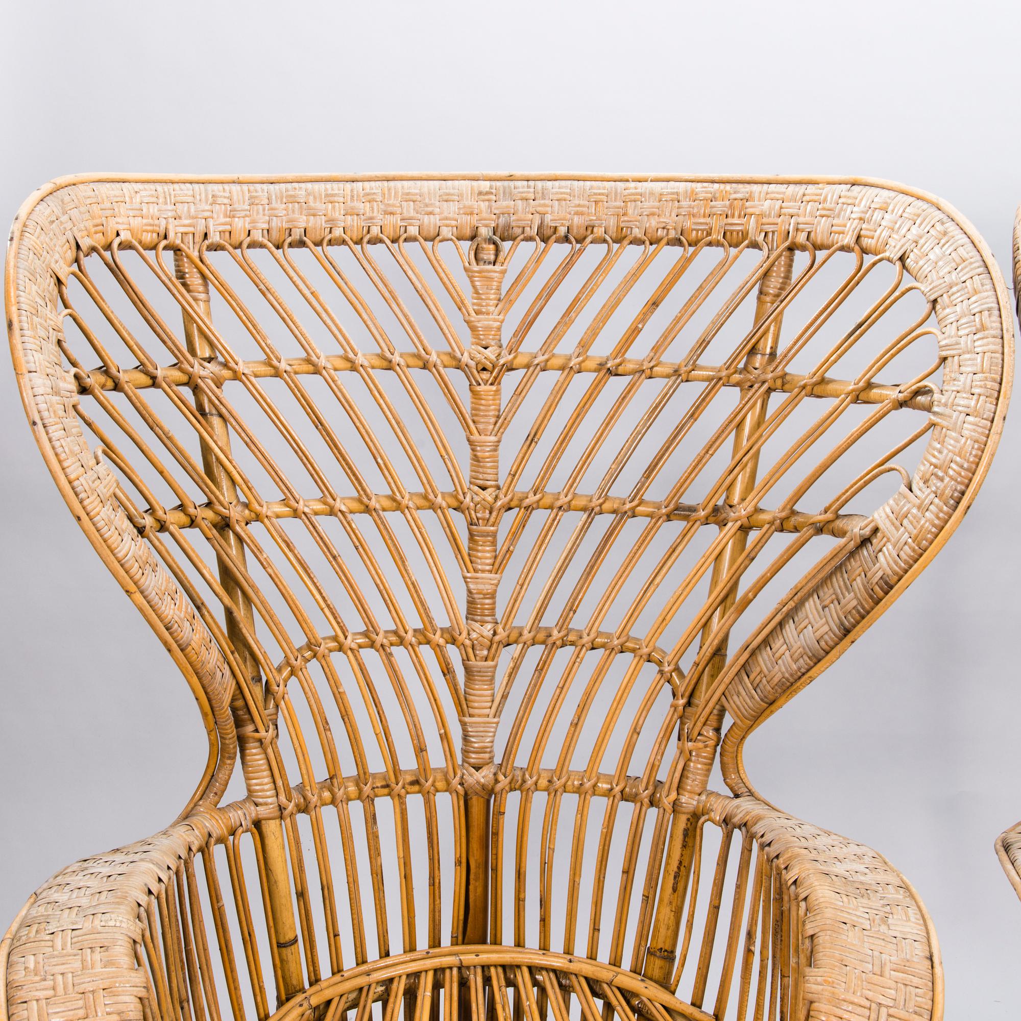 GIO PONTI & LIO CARMINATI, A pair of 'Conte Biancamano' rattan Wingback Armchairs for Bonacina, Italy.