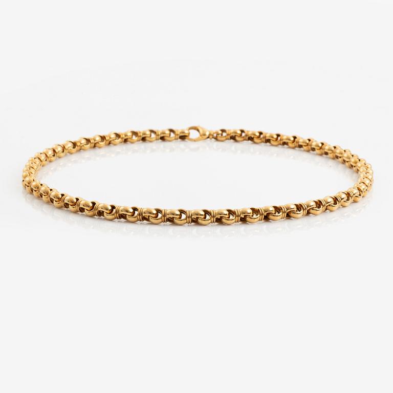 An 18K gold Tännler necklace.