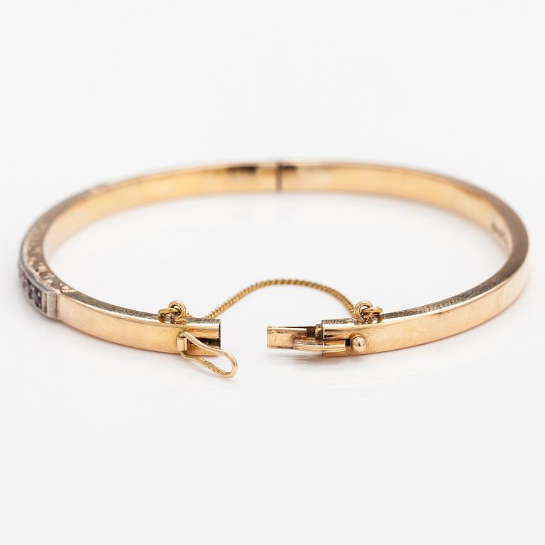 ARMBAND, 14K guld, syntetiska rubiner. Tarkkanen Oy, Helsingfors 1959.