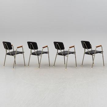 Four tubular steel armchairs, 1950's.