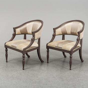 A pair of contemporary chairs in Neo classical style.