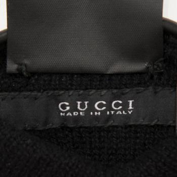 A pair of Gucci ladies' leather gloves.