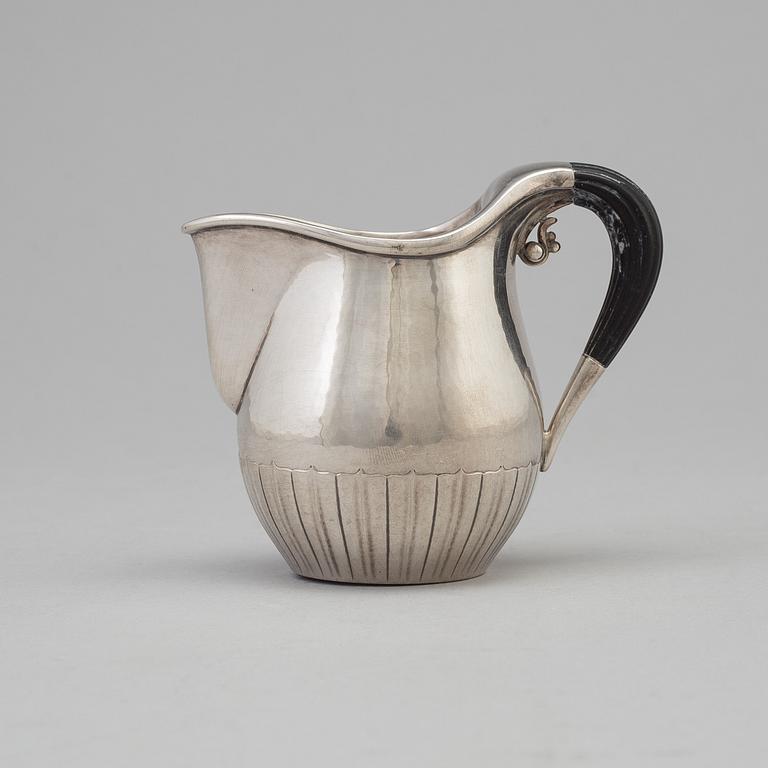 A three piece sterling silver coffee service "Cosmos" design Johan Rohde for Georg Jensen, Copenhage.