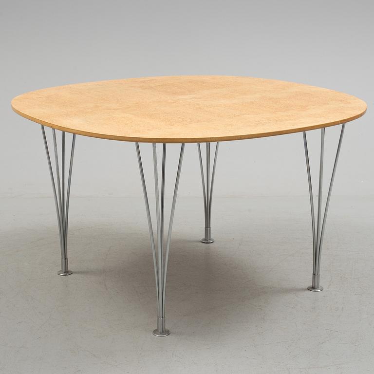 A "Supercirkel" Piet Hein and Bruno Mathsson dining table from Bruno Mathsson International.