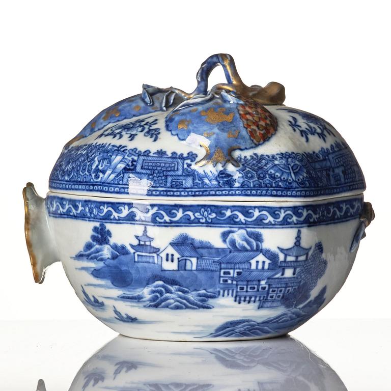 A Chinese blue and white 'pomegranate' tureen with cover and stand, Qing dynasty, Qianlong (1736-95).