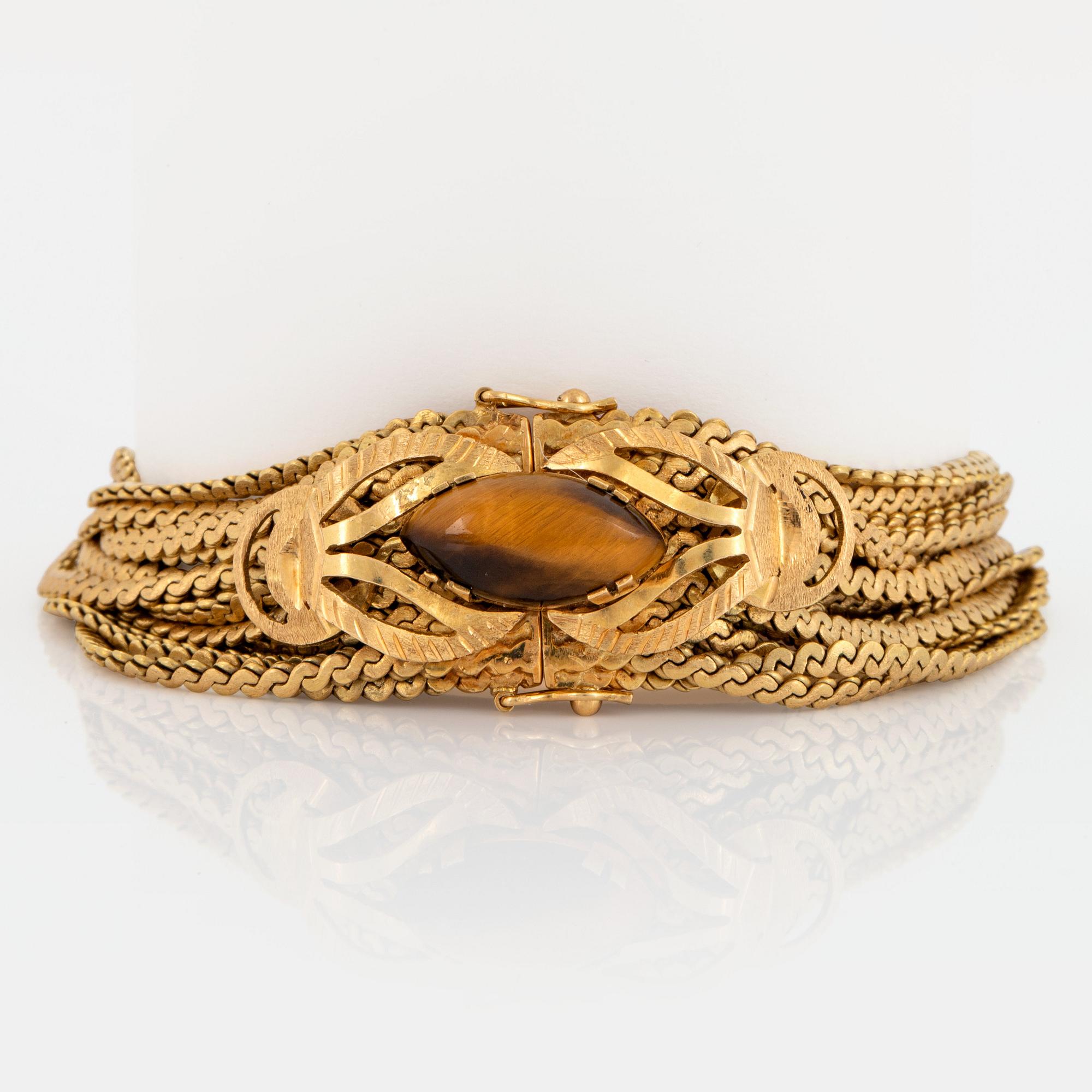 Armband 18K guld med kvarts-kattöga.