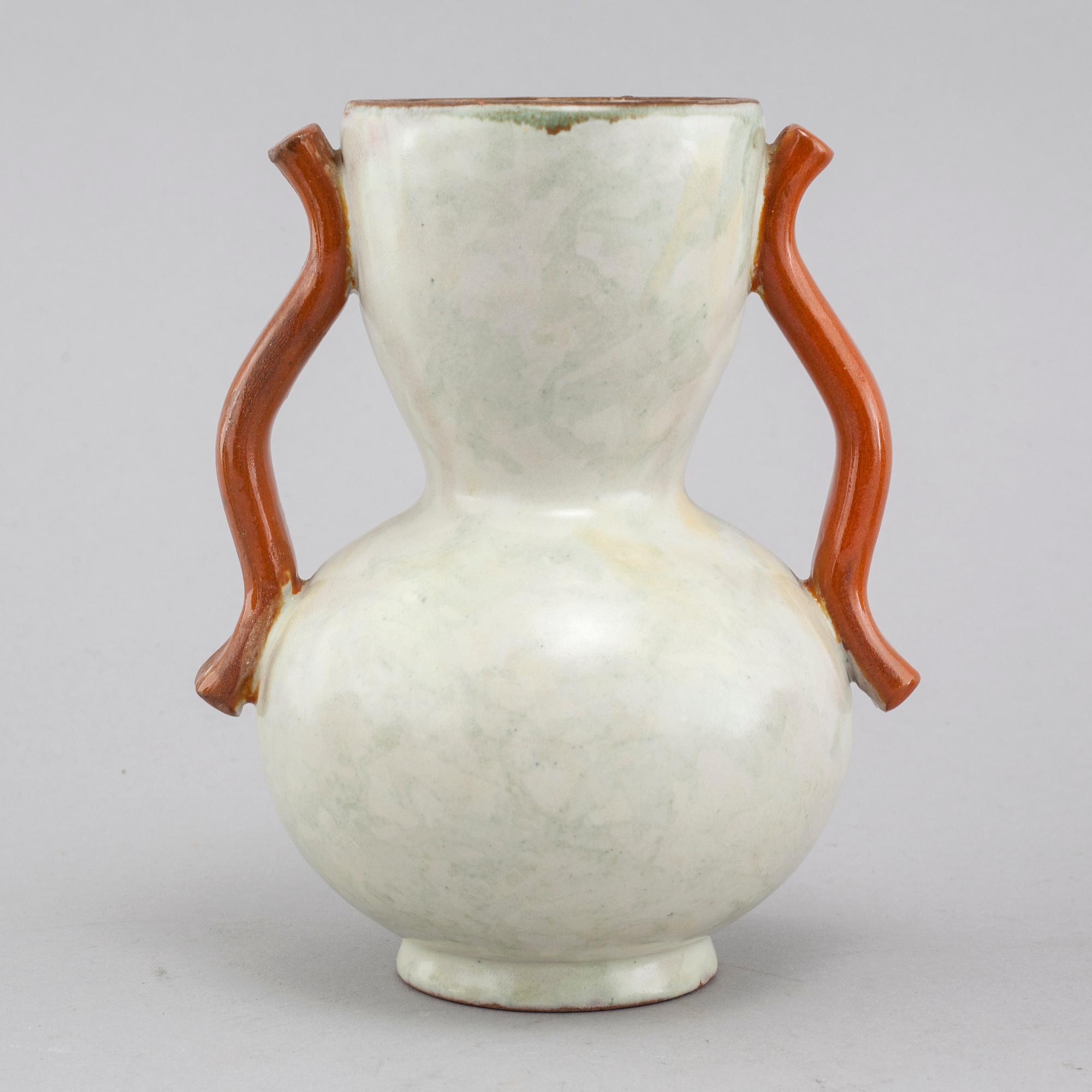 Three vases and on Upsala Ekeby, mid 20th century.