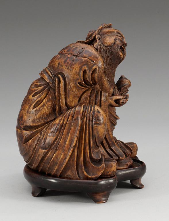 A carved bamboo figure of Do Fan So, Qing dynasty (1644-1912).