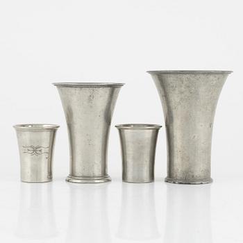 Firma Svenskt Tenn, four pewter beakers, Stockholm 1927, 1928 and 1929.