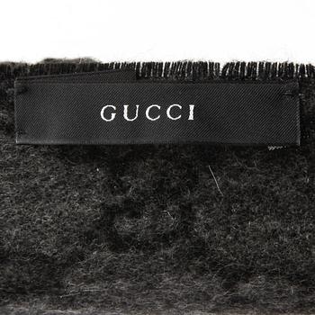 GUCCI, a cashmere and lapin scarf.