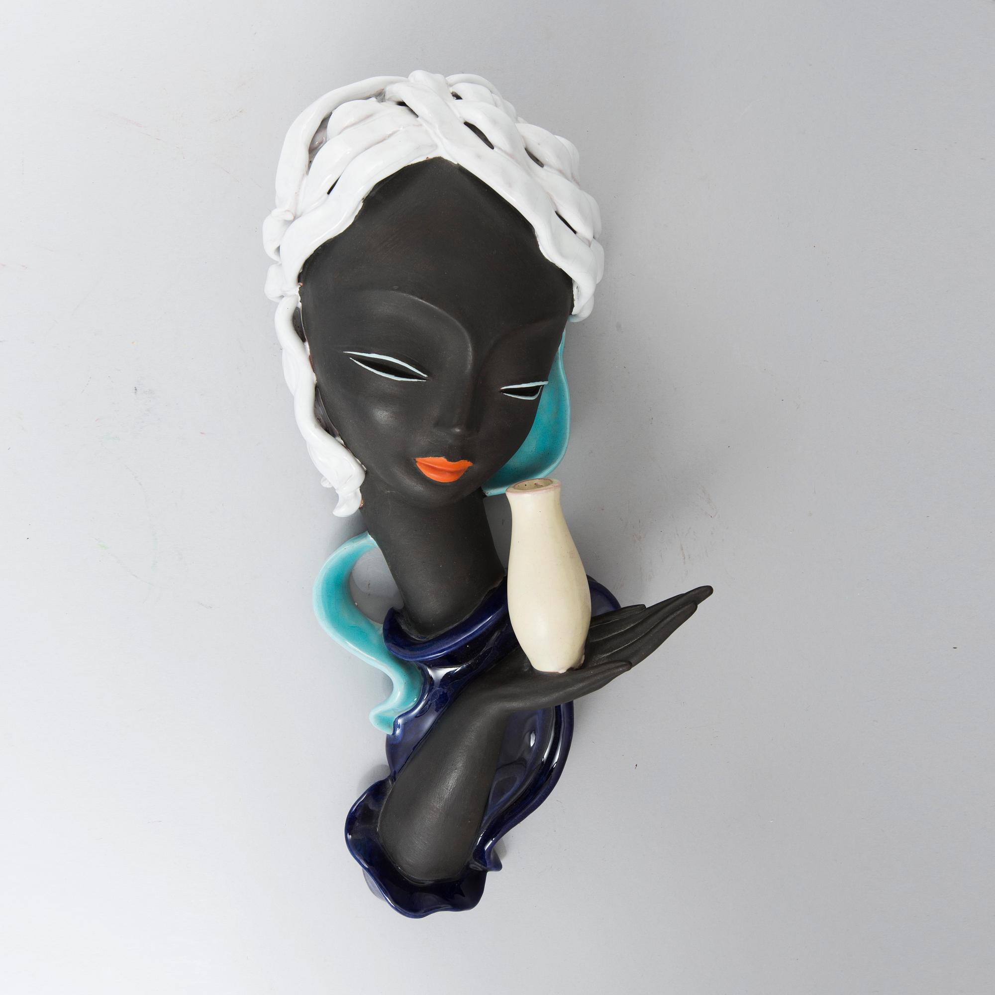 A ceramic wall plaque by Goldscheider Austria 1920/30s.